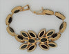 D&E Dog Tooth Ruby & Emerald Gold Tone Vintage Bracelet